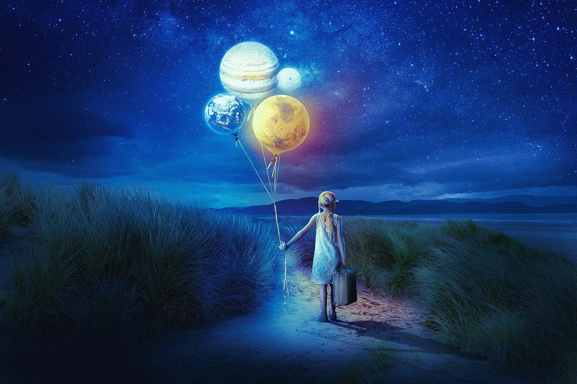 Imaginative portrait of a little girl holding two balloons shaped as planets at night.