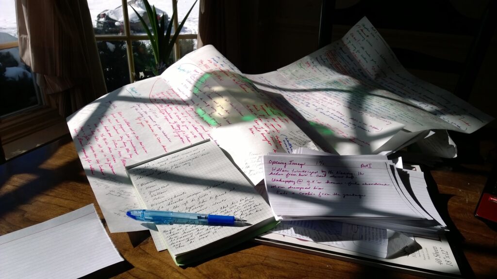 Photo of a mess of paper and note cards.